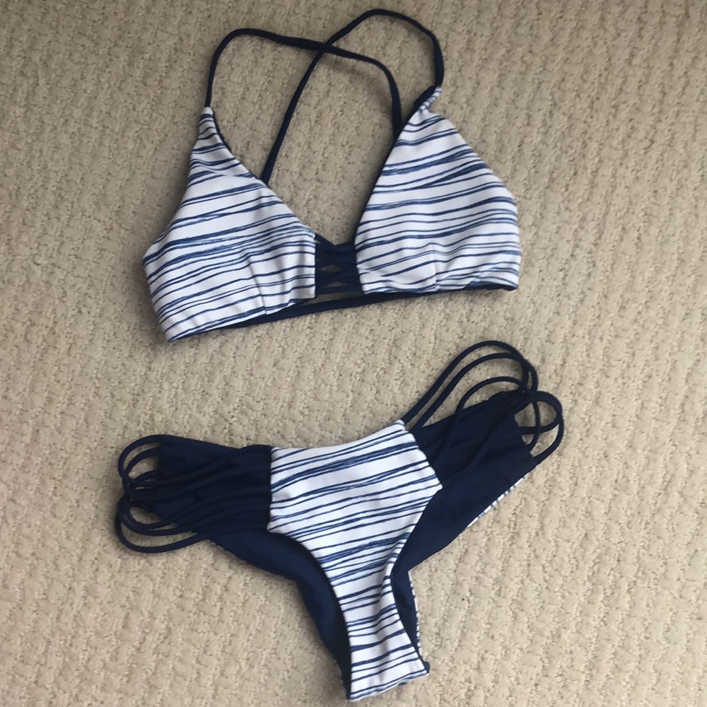 Beach babe swimwear. Medium bottom, small top.
